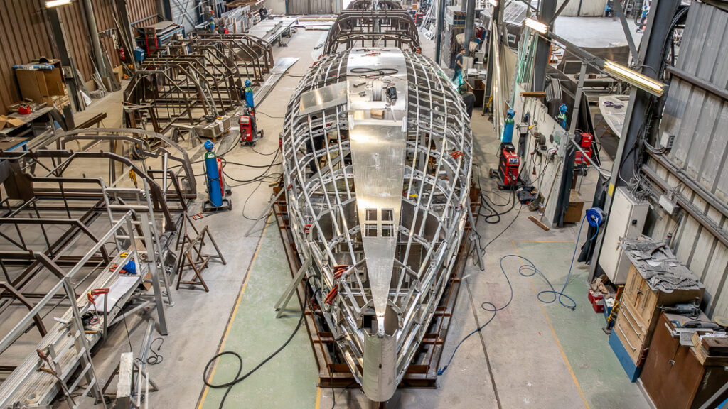 Alubat's Cigale 15 QR in construction - aerial view of shed interior