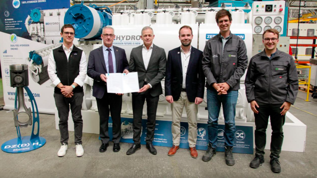 A group of men and a certificate