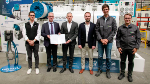 A group of men and a certificate