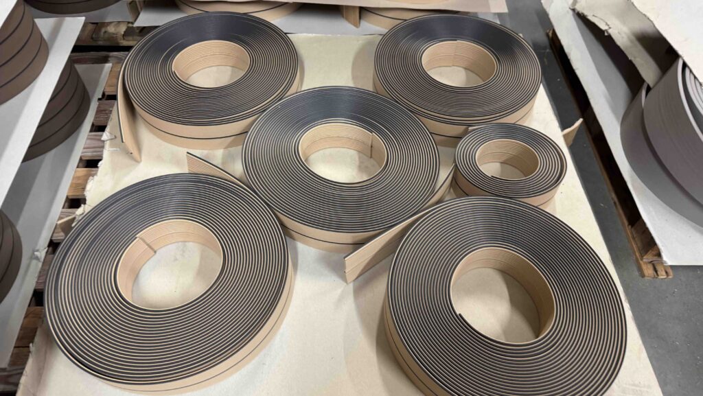 rolls of Flexiteek after coming off the production line in the factory
