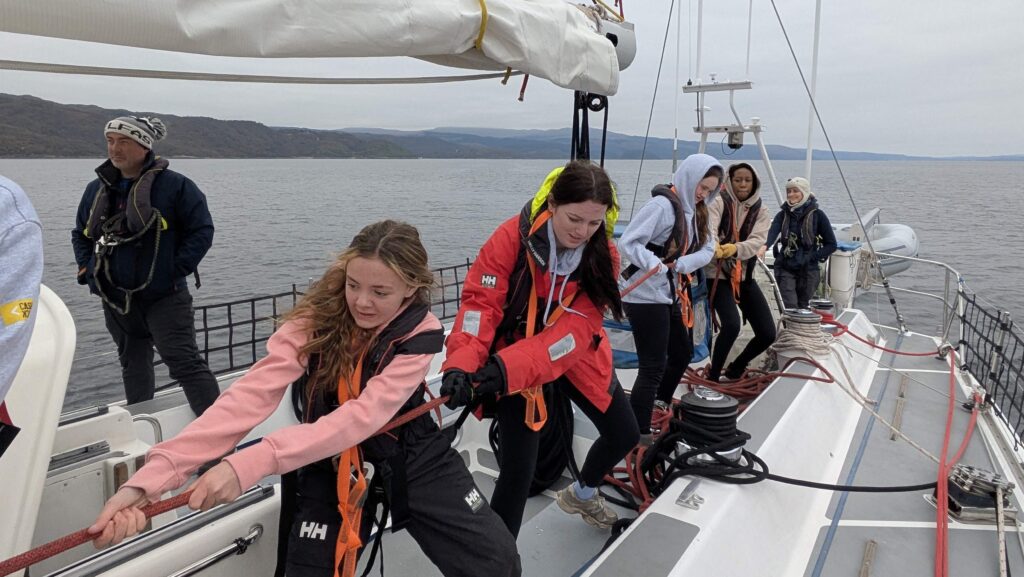 young sailors onboard a sailing boat