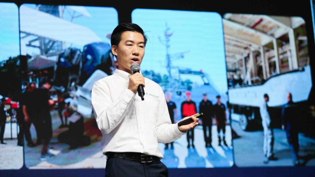 man in shirt making a presentation