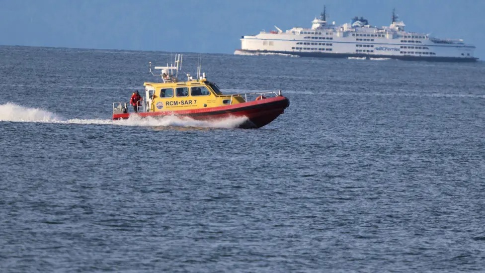 Rescue crews search the water off Richmond