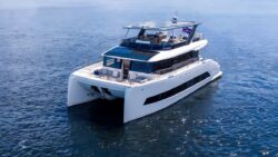 white catamaran at sea
