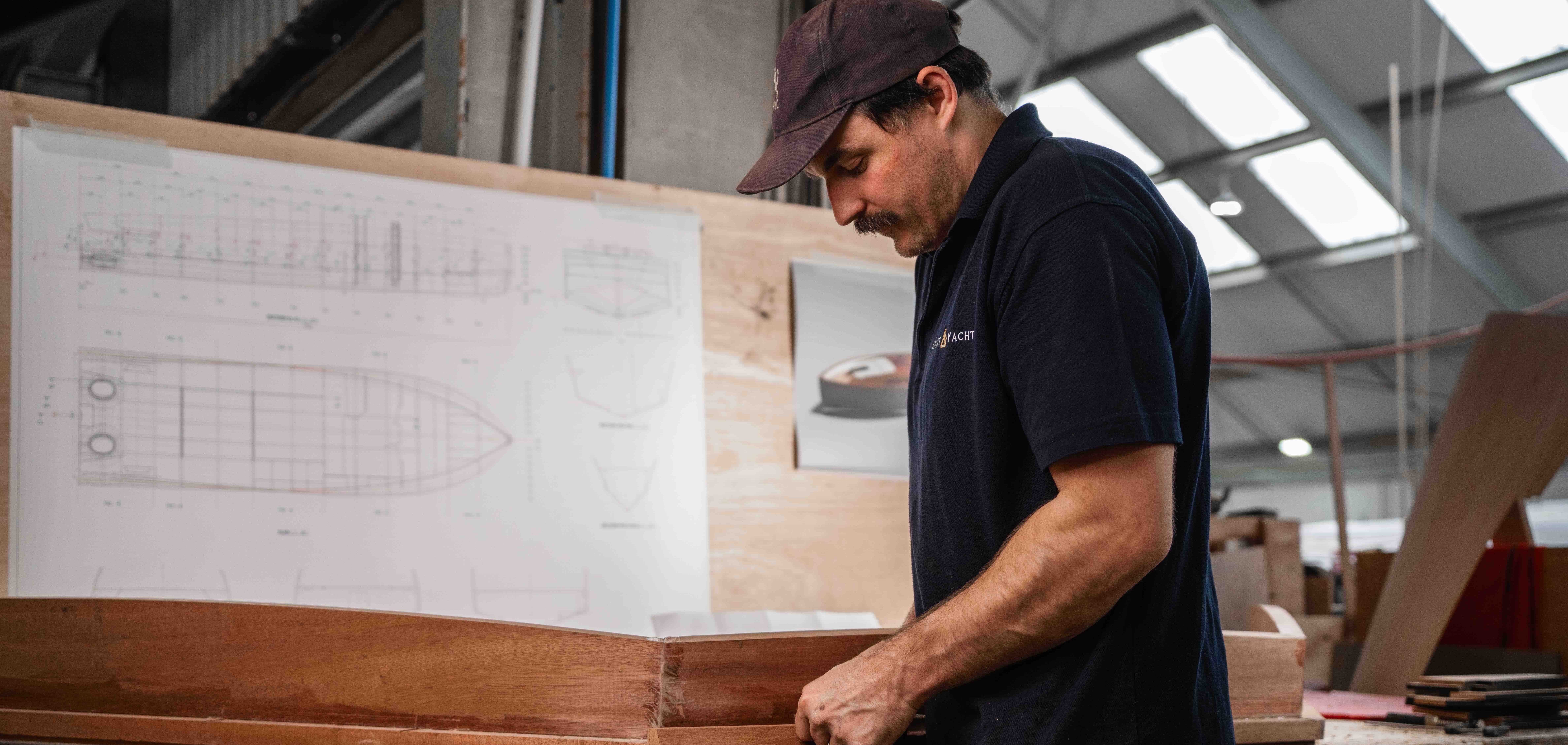 man at Spirit Yachts' bench