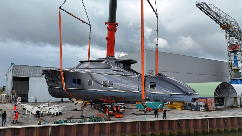 Zeelander 8 prior to launch in sling above boatyard