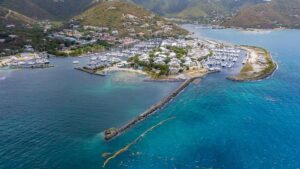 Aerial view of Caribbean marina and mountain backdrop