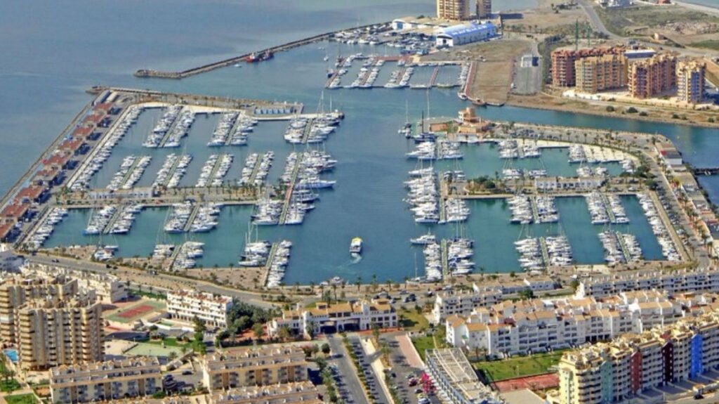 Aerial view of a marina in the Region of Murcia with yachts and boats berthed.