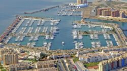 Aerial view of a marina in the Region of Murcia with yachts and boats berthed.