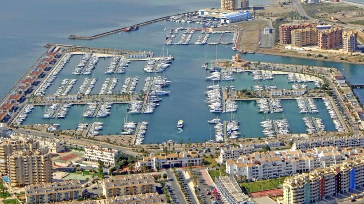 Aerial view of a marina in the Region of Murcia with yachts and boats berthed.