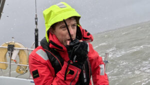 Person at sea on radio
