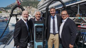 Stewart Wilkinson, Bernard d'Alessandri, Jeremie Larrigue, and Fabrizo Zago pose to annouce the Aqua superPower aquisition