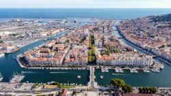 Aerial view of Sète on France's Mediterranean coast, showing its marinas, canals, harbour, and waterfront.