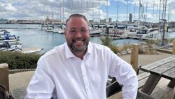 Man in front of Portsmouth Harbour - it's Earle Stanner, CEO of British Marine