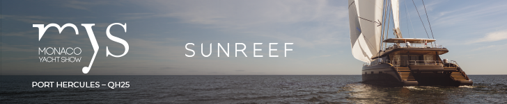 Catamaran yacht sailing on calm sea under clear sky, promoting Sunreef at Monaco Yacht Show.