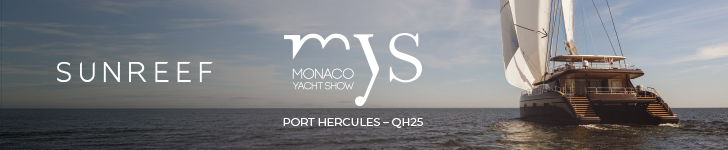 Catamaran yacht sailing on calm sea under clear sky, promoting Sunreef at Monaco Yacht Show.