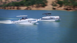 two electric boats racing