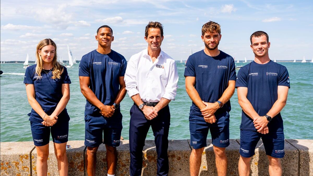 Sir Ben Ainslie with Athena Pathway youth sailors.