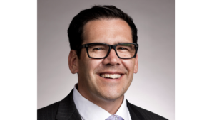 man in suit smiling