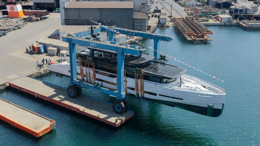GX42 superyacht in crane lift being launched