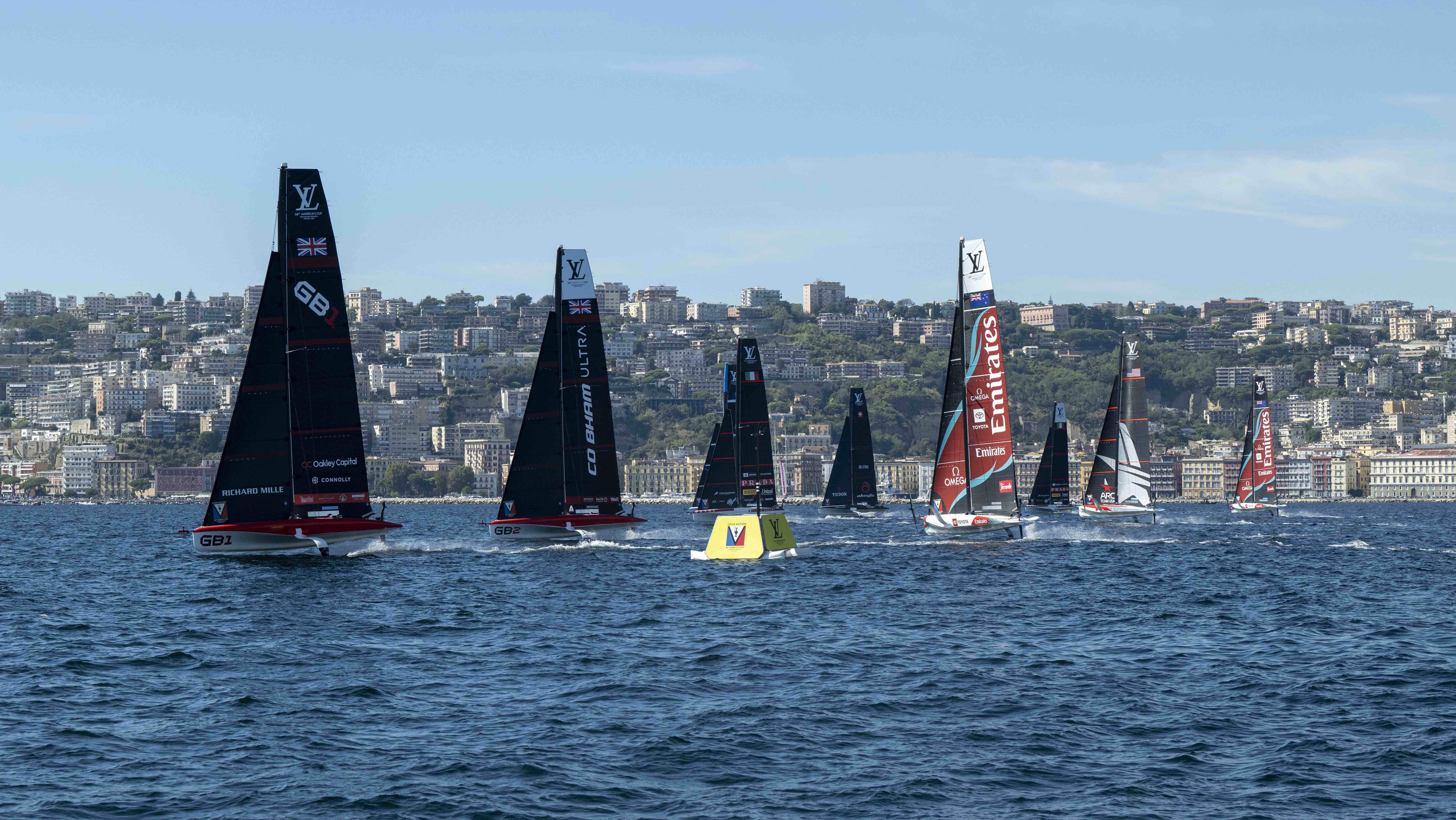 AC40 sailboats on water