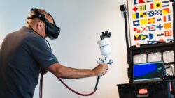 AkzoNobel applicator using a VR spray-gun simulation for yacht painting training