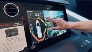 Avikus NEUBOAT dashboard wuth human hand