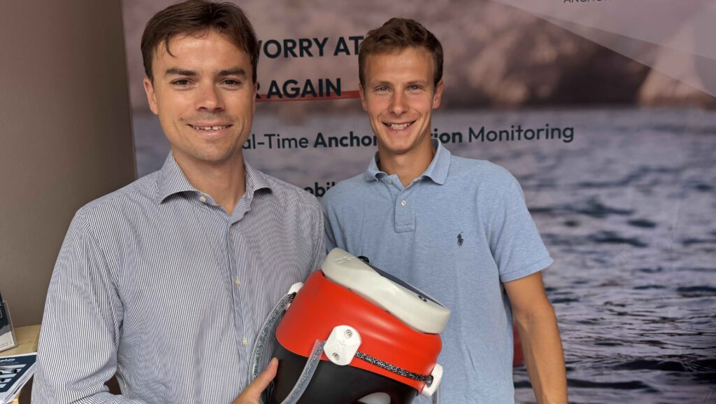 two men and an anchor buoy