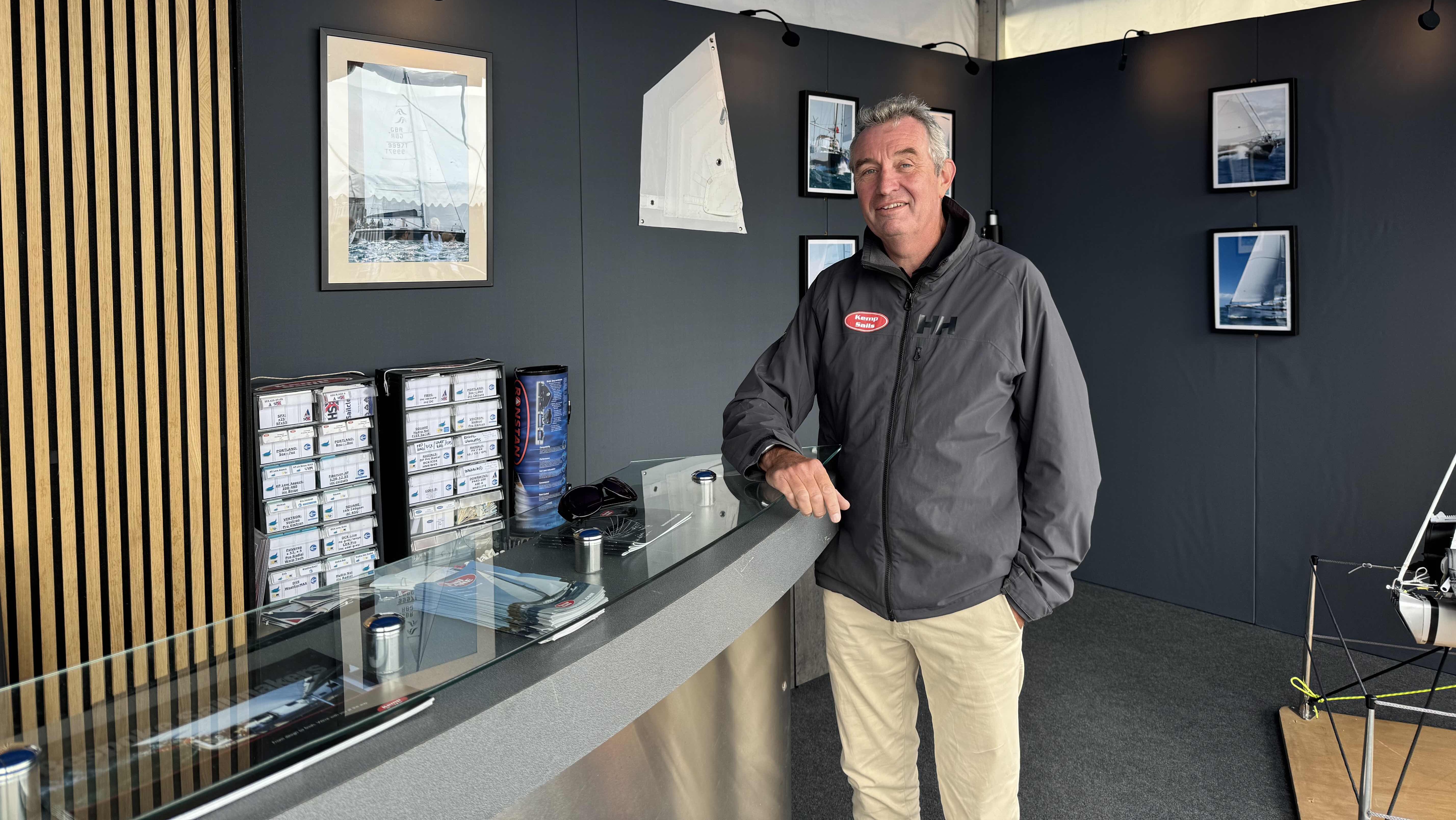 Rob Kemp, Kemp Sails director, standing at his SIBS booth