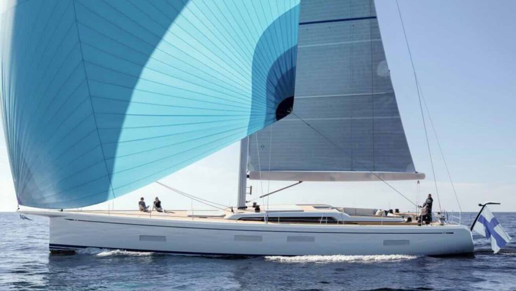 Swan 73 sailing yacht with billowing light blue sail
