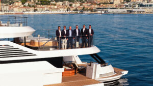 Azimut yacht with representatives of Assets Group and Azimut Yachts during the partnership signing at the Cannes Yachting Festival