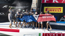 Luna Rosa team spraying champange after America's Cup win