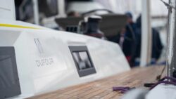 Dufour yacht against dock with logo showing