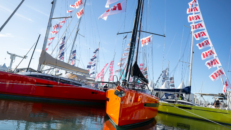 Three colourful bows of boats