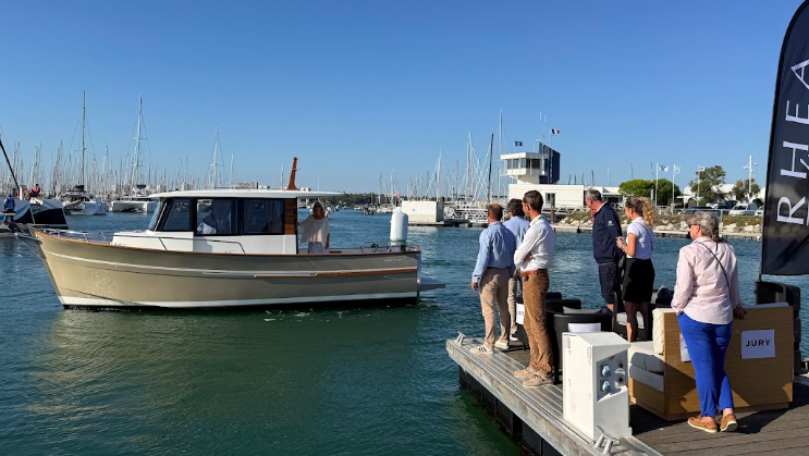 people stand on dock and wait for motor launch
