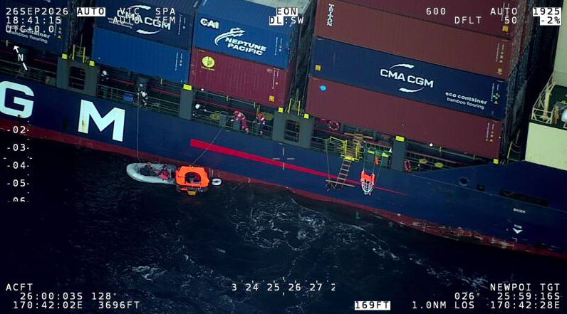 Rescued sailors climb onto container ship. Image courtesy of New Zealand Defence Force