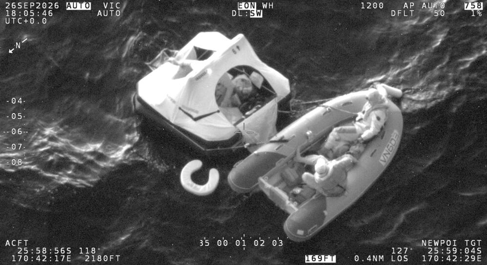 aerial view of dinghy and life raft after crew abandon yacht hit by sperm whale in Pacific Ocean