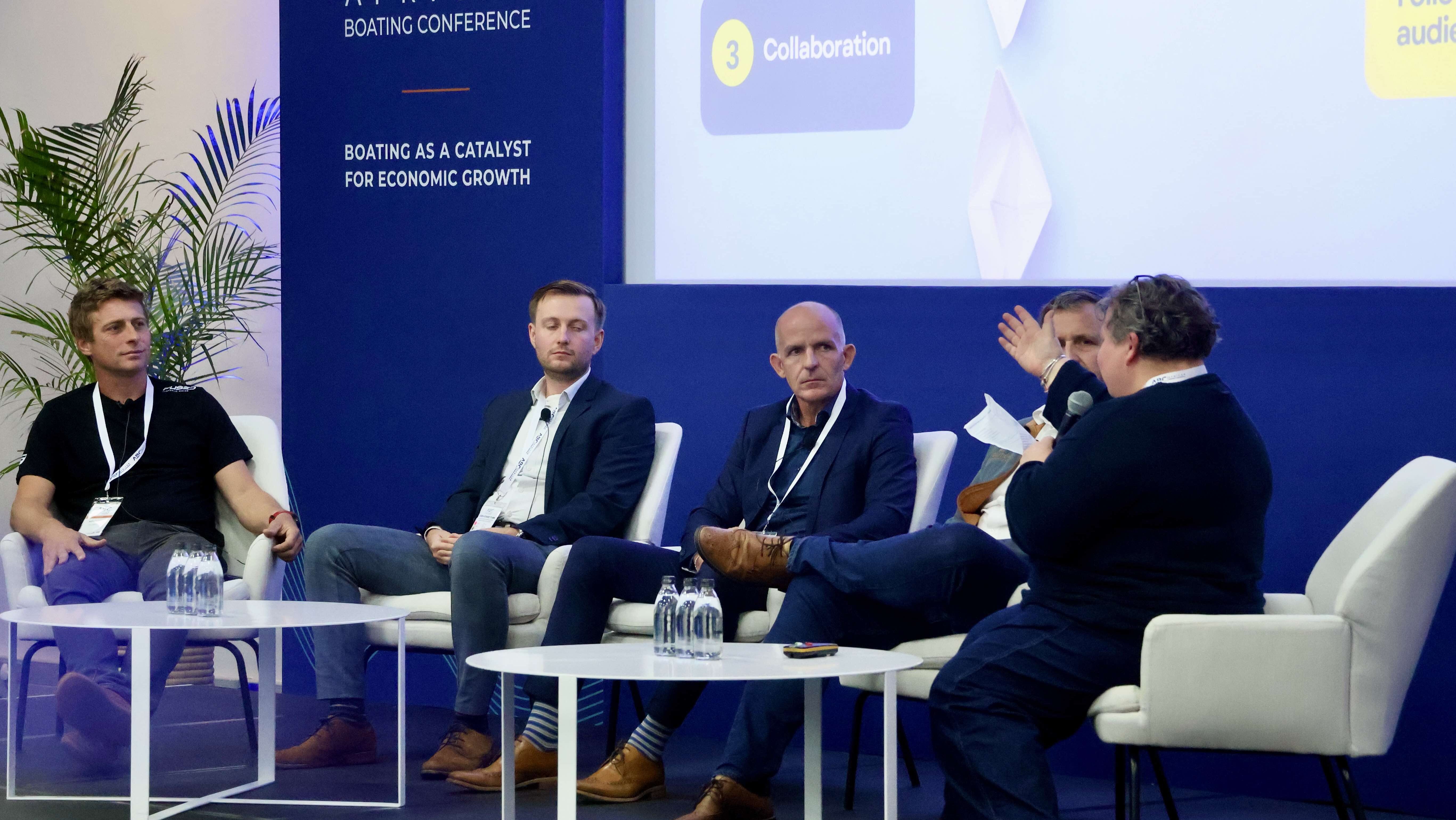 A group of people in a panel discussion