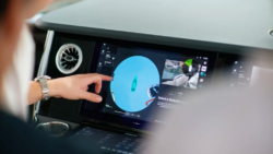 finger points at screen on boat - this is Saxdor's helm using Simrad AutoCaptain